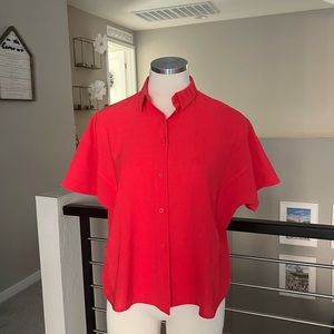 Lululemon red shirt, size 4 and it’s in perfect condition (gentle worn once)